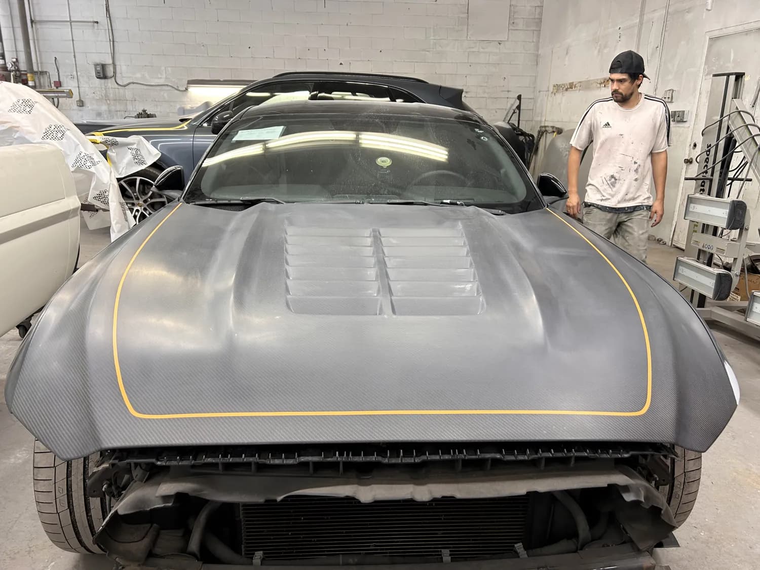 Matte-finish Lamborghini front end in the shop.