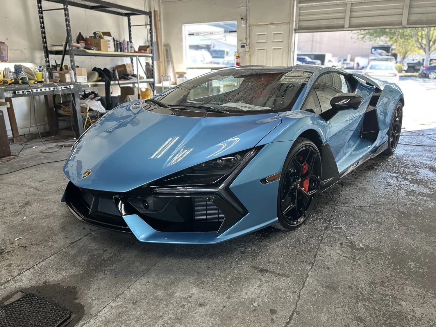 Teal Lamborghini refinished in the shop.