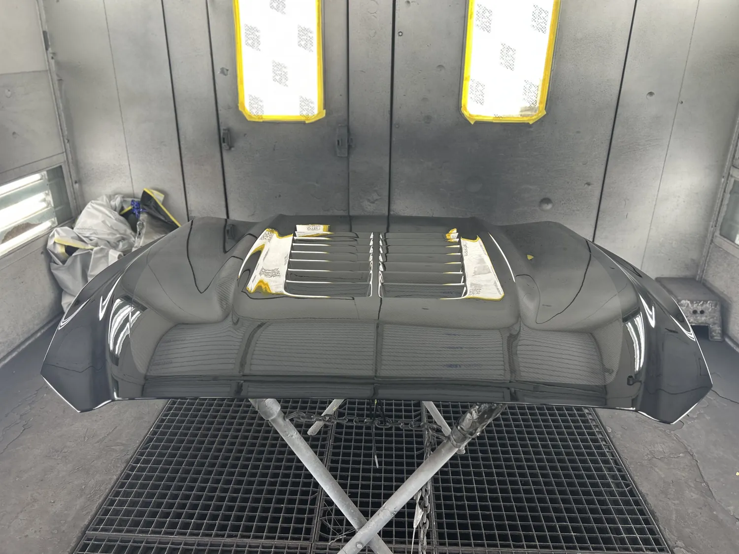 Vehicle panel refinished in the booth.