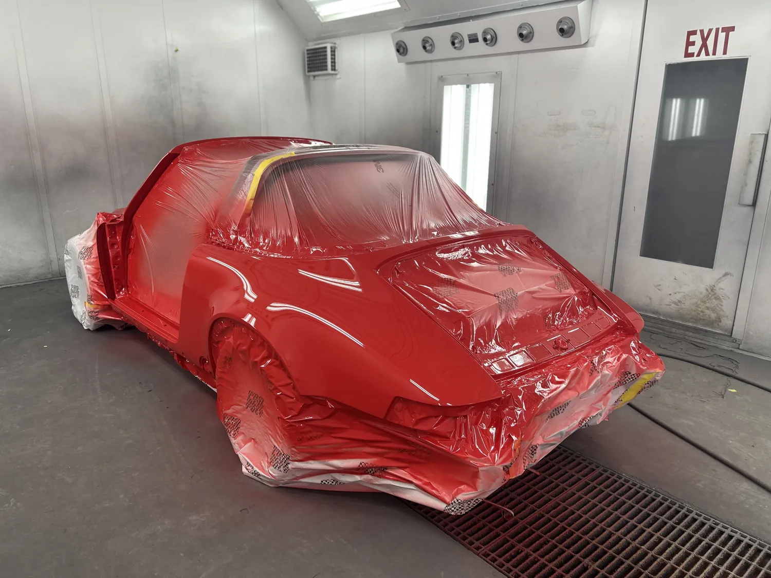 Classic Porsche 911 masked for paint.